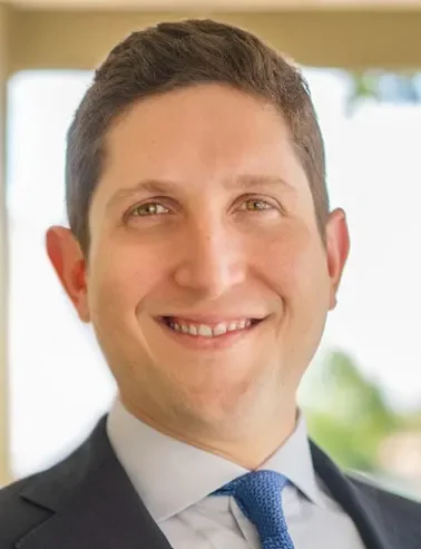 A headshot of Bainbridge Executive Vice President and Chief Legal Officer Brian Doppelt