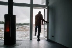 man leaving out of door